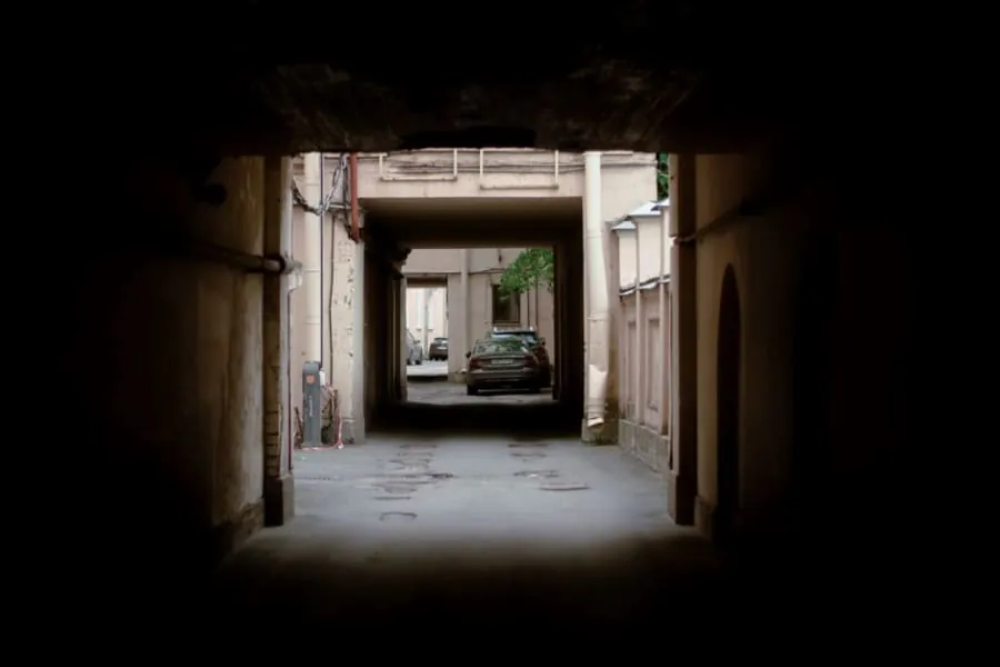 A car parked on a compact driveway
