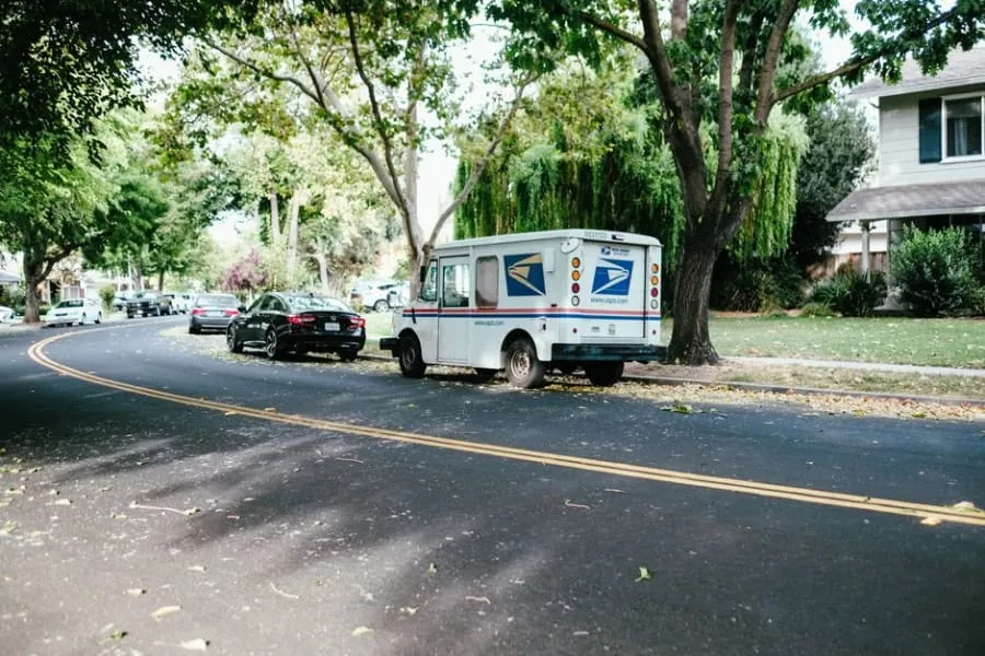A delivery van on a residential street