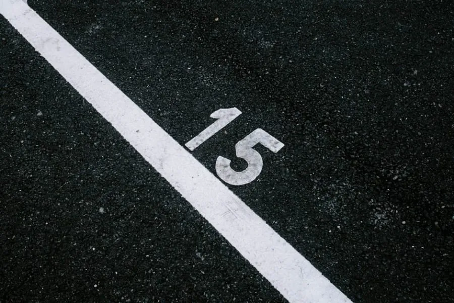 A boundary line across a driveway