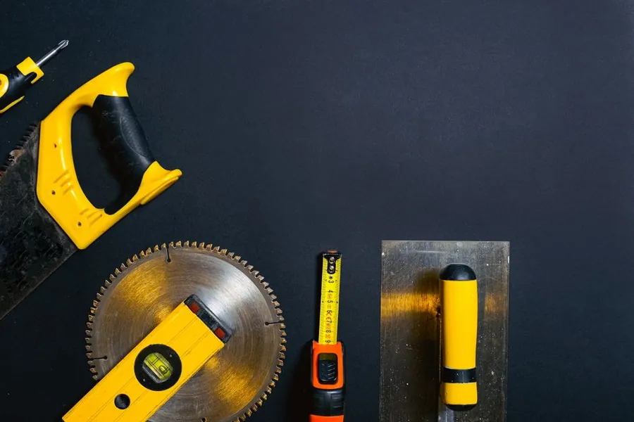 Measuring and levelling tools laid out ready for setting driveway levels