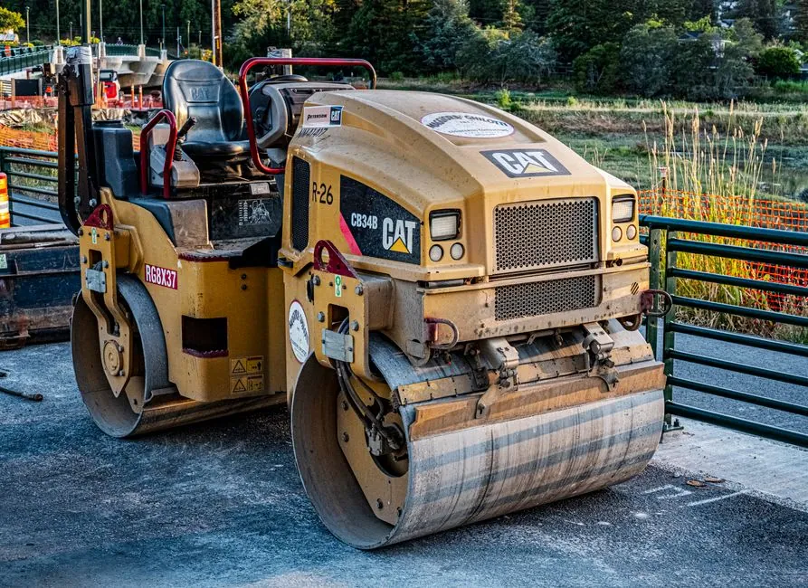 A deep compacted stone sub-base under a driveway