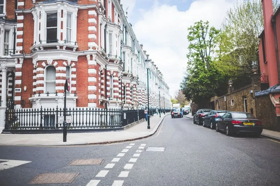 A pavement and kerb line outside period houses where a vehicle crossing would be formed