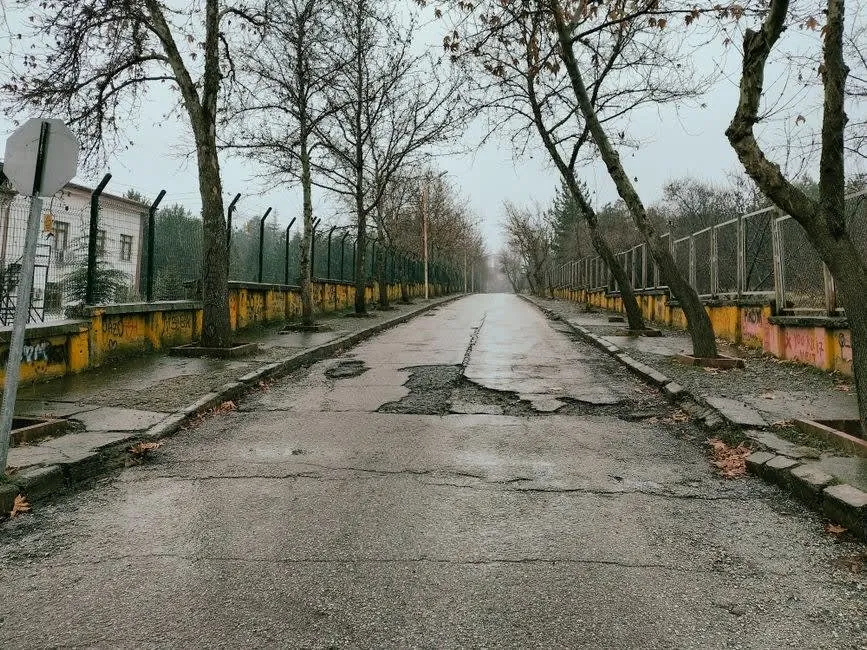 A deteriorated surface showing the rutting and break-up caused by an inadequate base