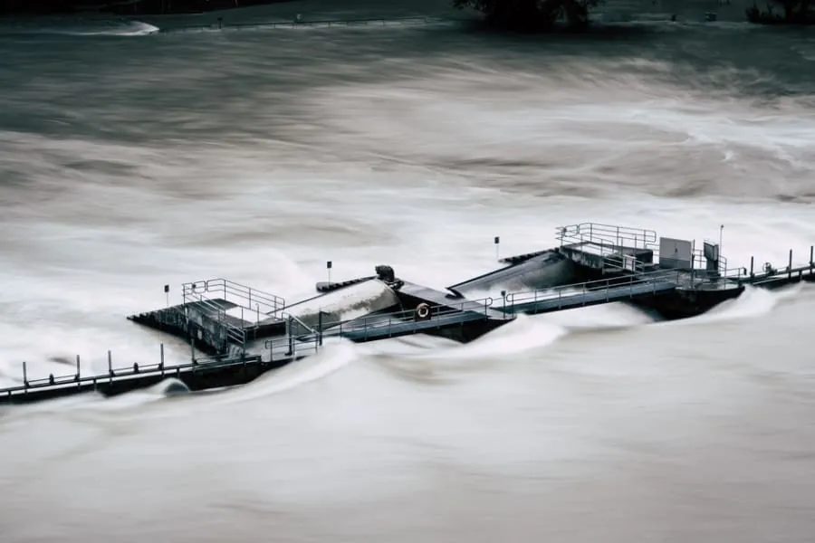 A flood defence wall beside a river