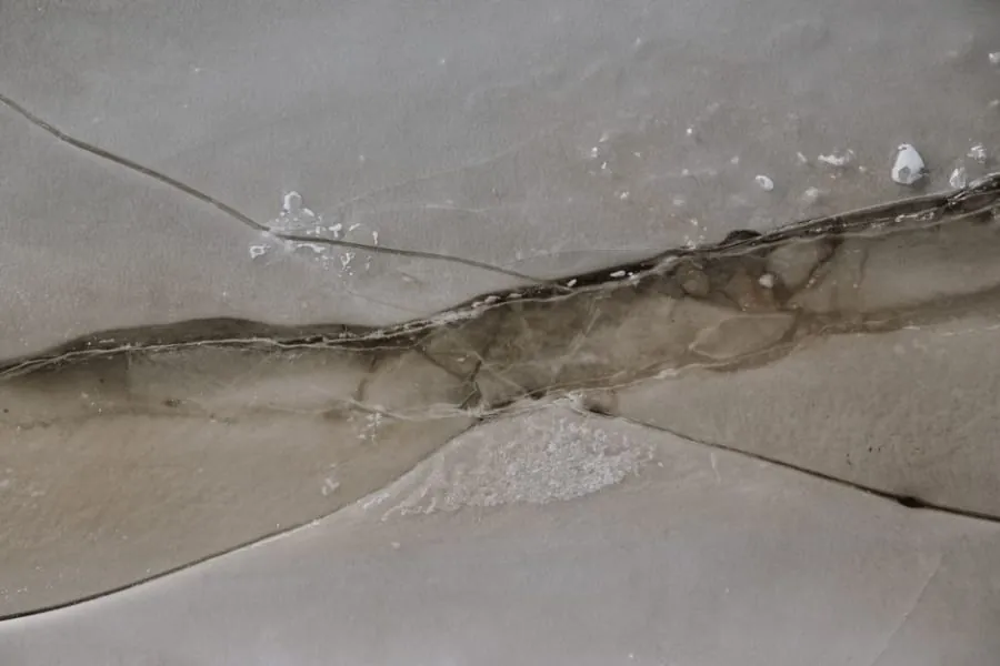 Frost damage on an old hard surface