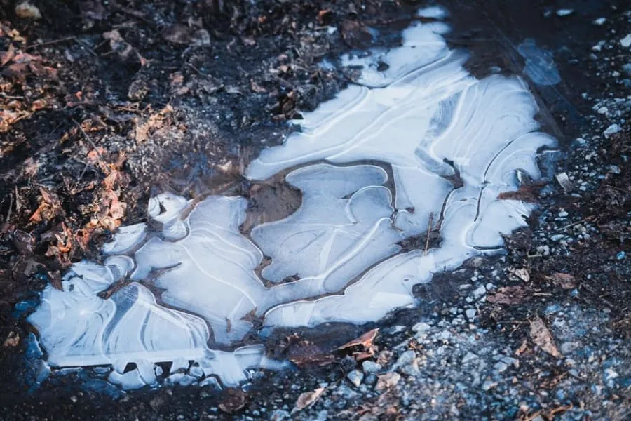 Ice forming on a sealed surface in winter