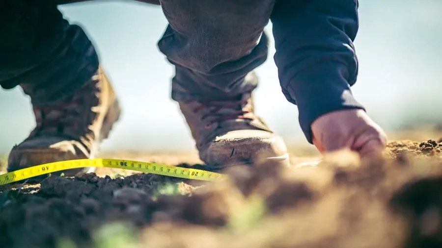 Measuring ground levels in a front garden before a driveway conversion