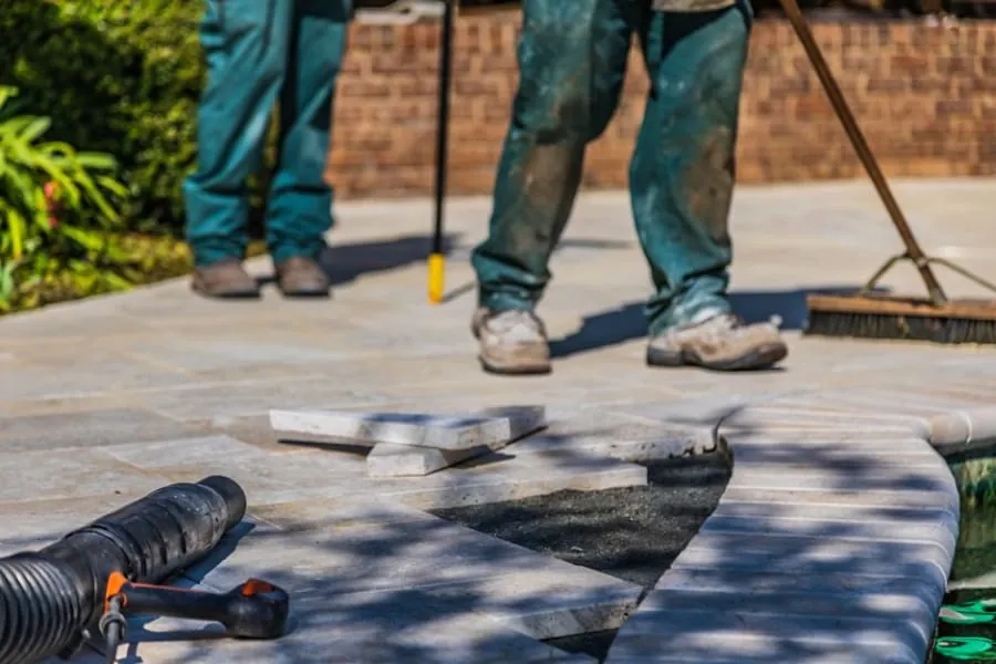 A patio being laid in a garden