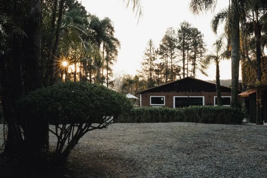 A permeable gravel-topped resin driveway outside a home