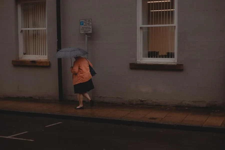 A rain-soaked northern English street, typical winter conditions on the Pennine edge