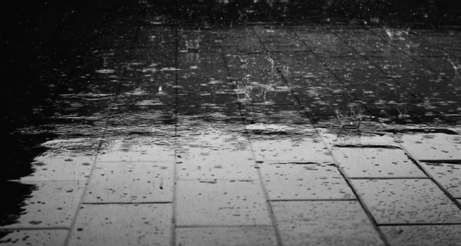 Rainwater draining away on a permeable driveway surface