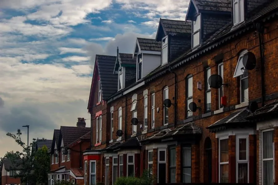 Red brick terraced houses in Greater Manchester of the kind targeted by doorstep driveway sellers
