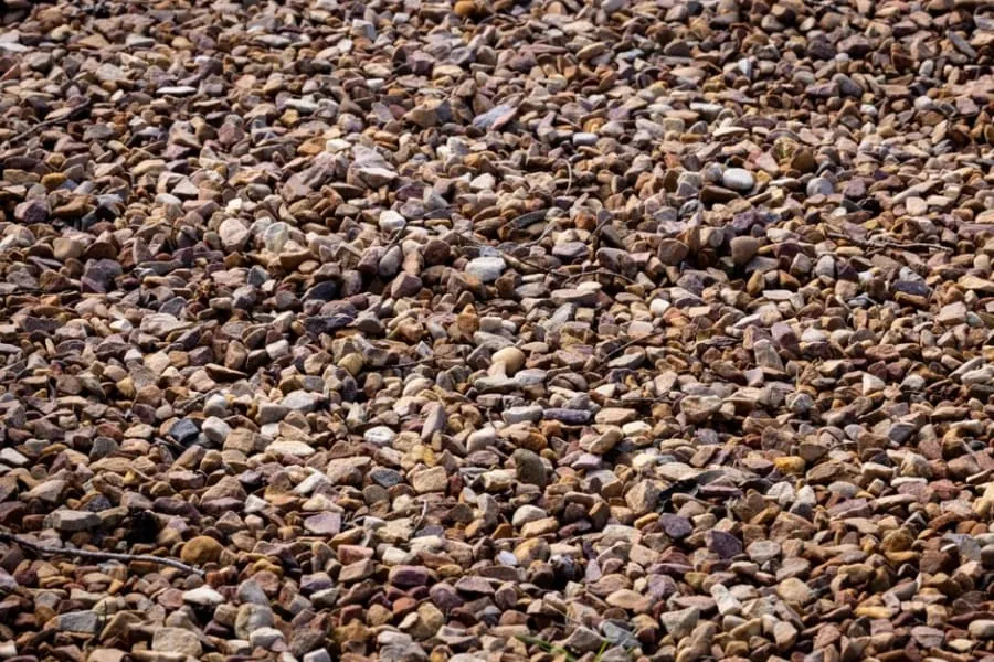 Loose gravel scattered onto a path