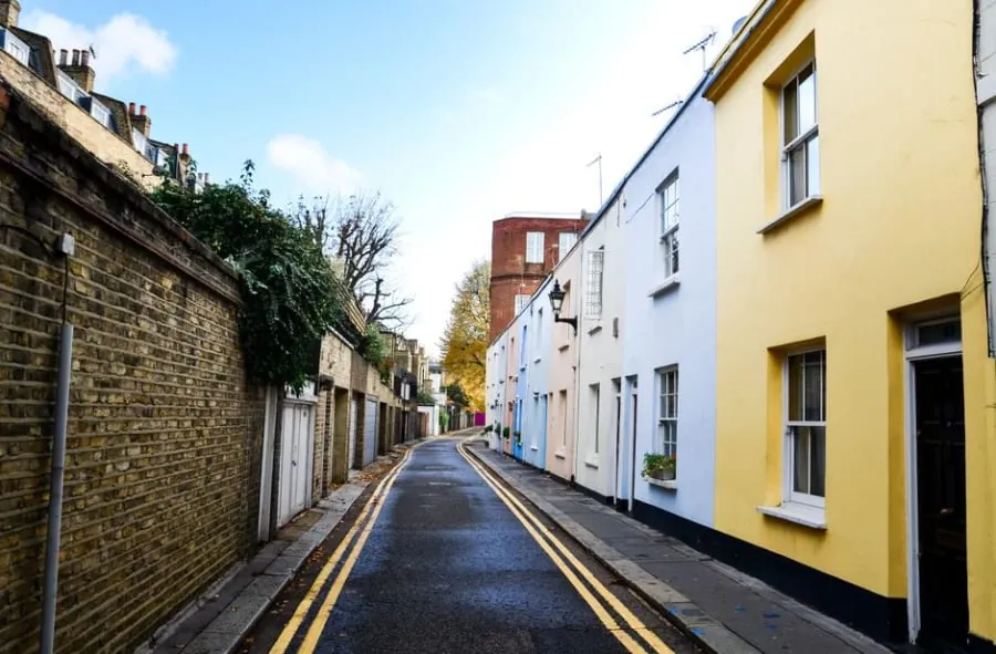 A narrow shared access way between houses