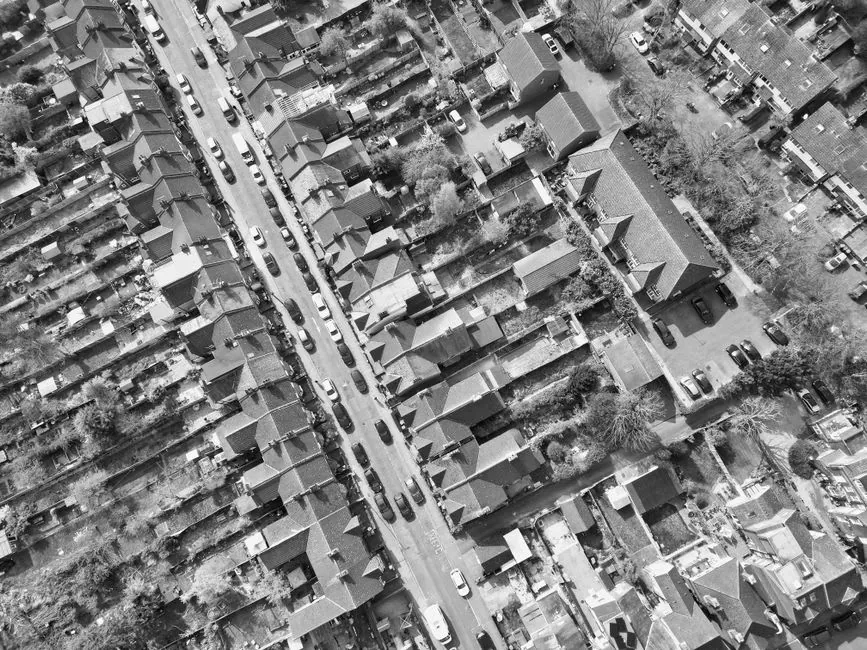 Terraced houses with a shared driveway between them