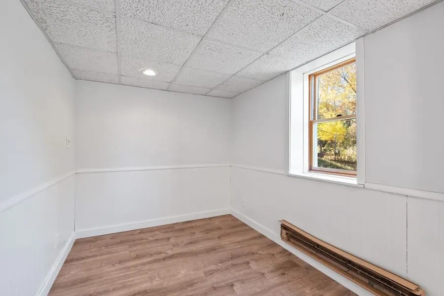 An empty room in a rental property between tenancies, the window when driveway work is easiest to schedule