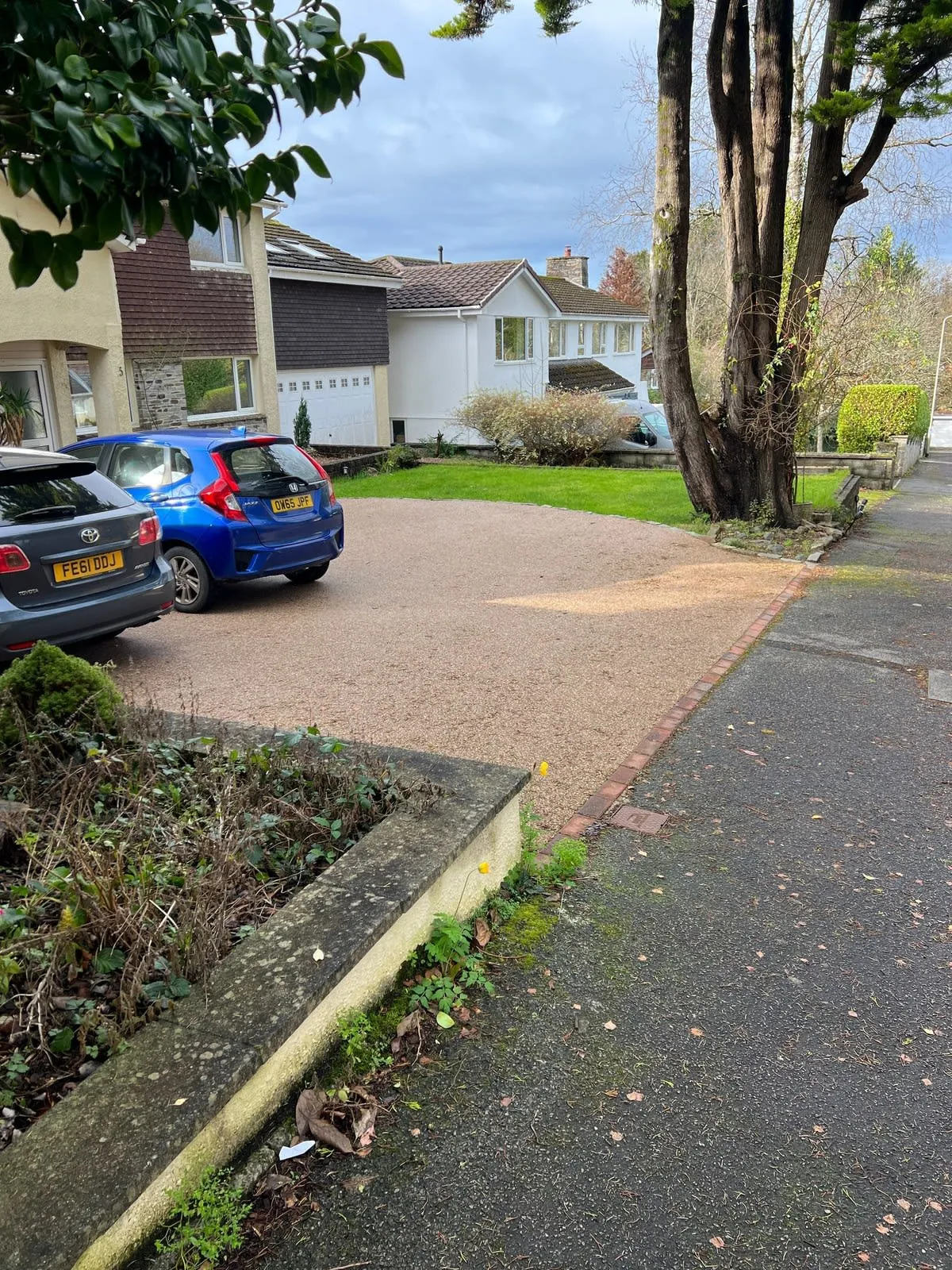 A resin bound driveway being installed at a home in Rochdale