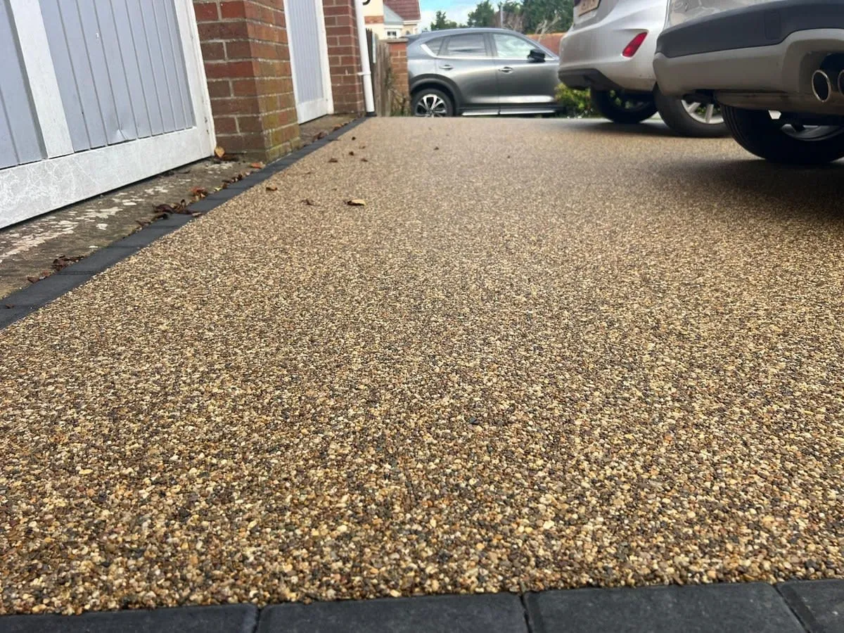 A domestic resin bound driveway outside a house in Rochdale
